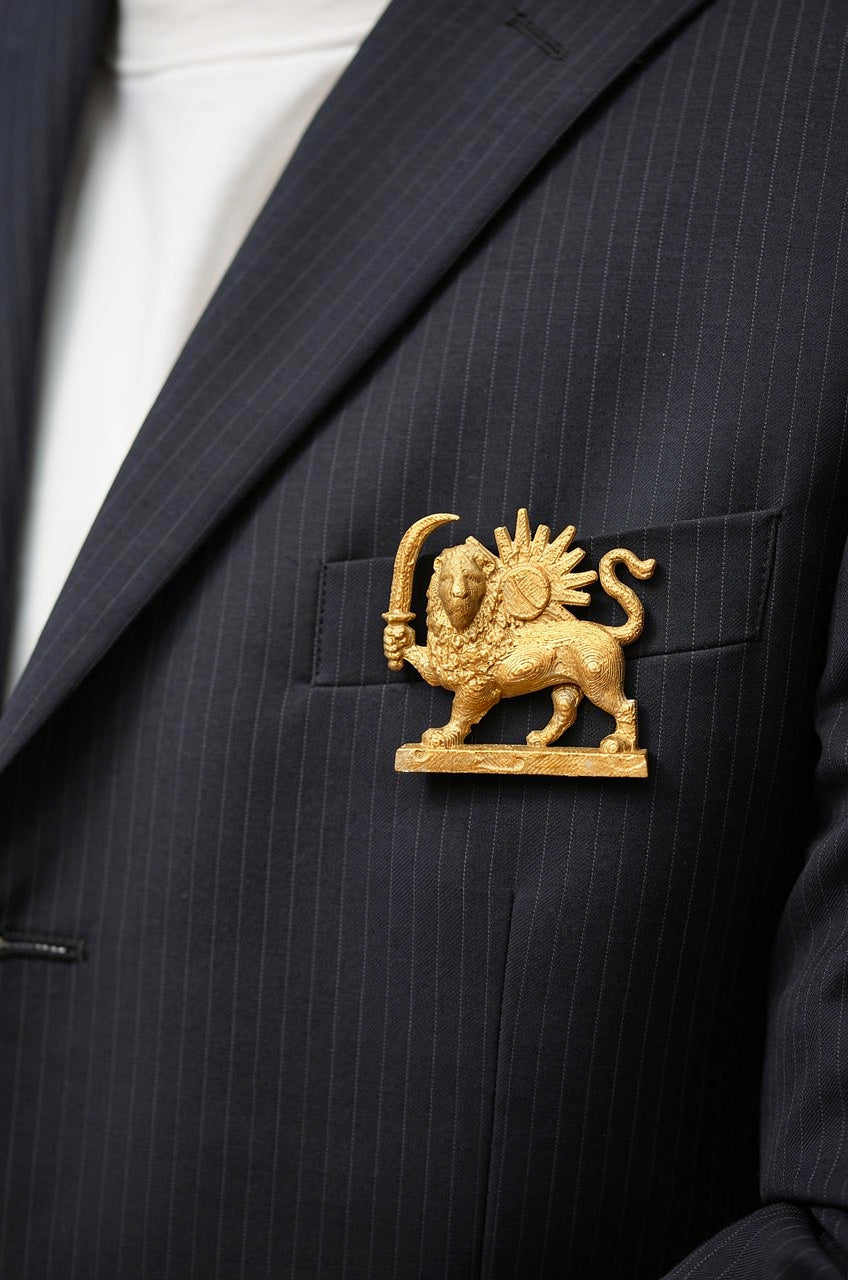 Gold 3D printed Lion and Sun brooch pinned on a black suit lapel, representing the historical Shir o Khorshid symbol of Iran
